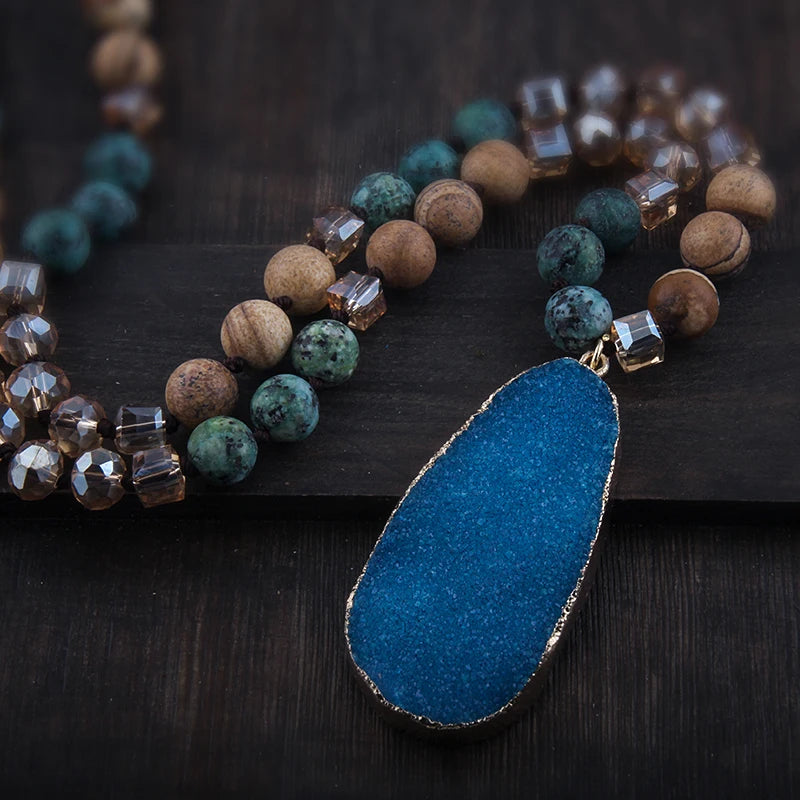 Boho-style necklace with natural stones, crystals, and a druzy drop pendant - a stylish gift for women