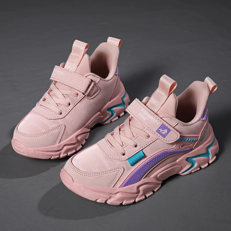 Pink leather girls' sneakers for casual wear. Comfortable and breathable, suitable for running and sports activities