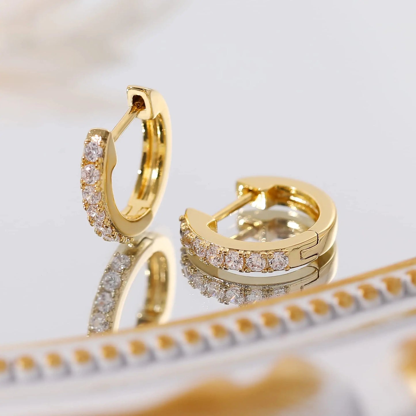 Vonmoos offers 1 Pair of Hoop Earrings for Women with 14K Real Gold Plating and Cubic Zirconia Inserts, a stylish addition to modern women's jewelry