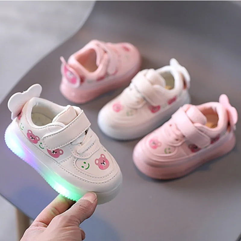 High-quality LED light-up sneakers for girls and boys featuring soft glowing soles and an adorable bear design