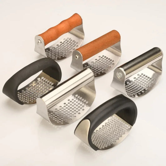 Stainless steel manual garlic press - a versatile curved slicer and chopper for the kitchen