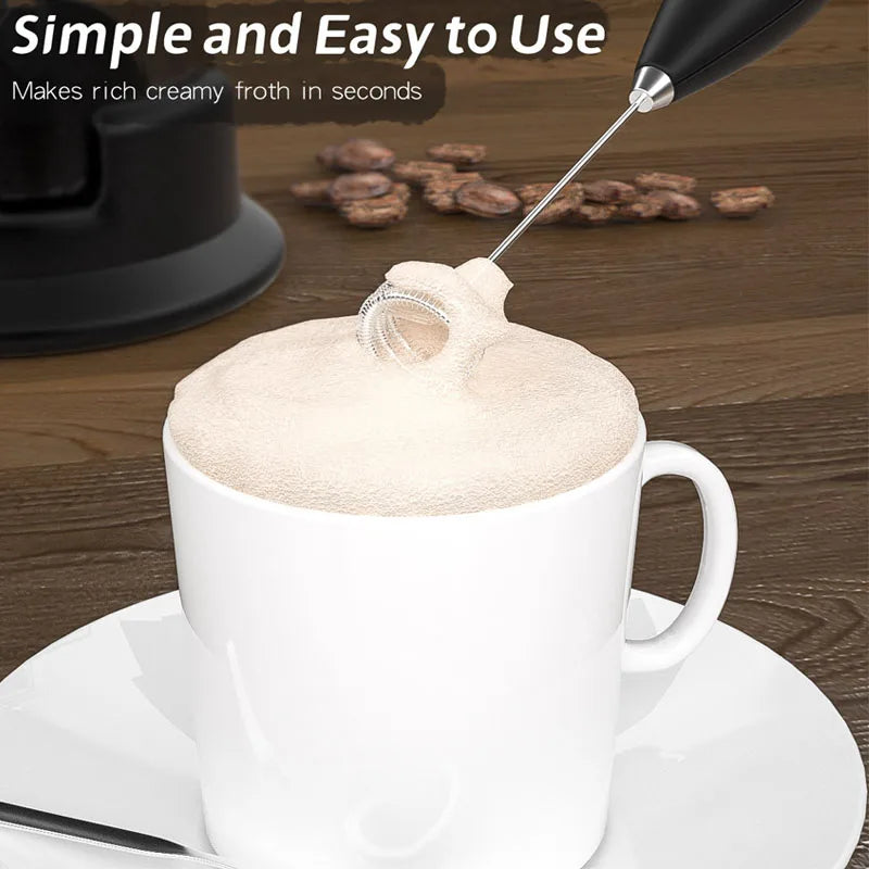 Handheld electric milk frother for whisking and mixing drinks, ideal for coffee and kitchen tasks