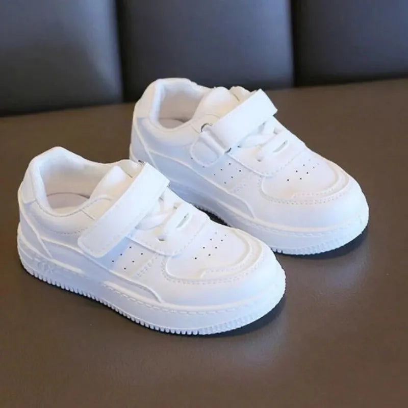 New spring/autumn tennis sneakers for kids. Soft leather casual board shoes for boys and girls