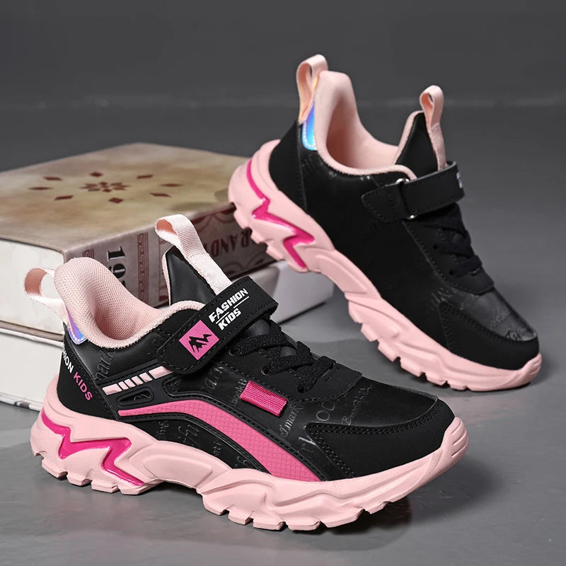 Pink leather girls' sneakers for casual wear. Comfortable and breathable, suitable for running and sports activities