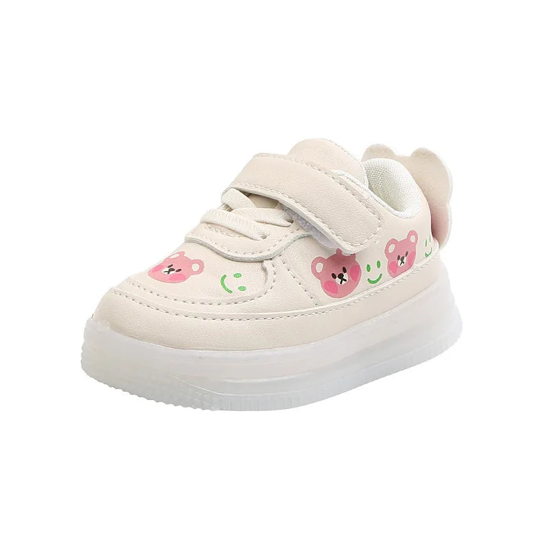 High-quality LED light-up sneakers for girls and boys featuring soft glowing soles and an adorable bear design