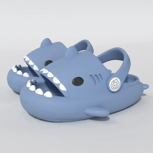 Children's sandals featuring cartoon shark design for boys and girls. Soft, thick sole for comfort and non-slip grip. Perfect for summer