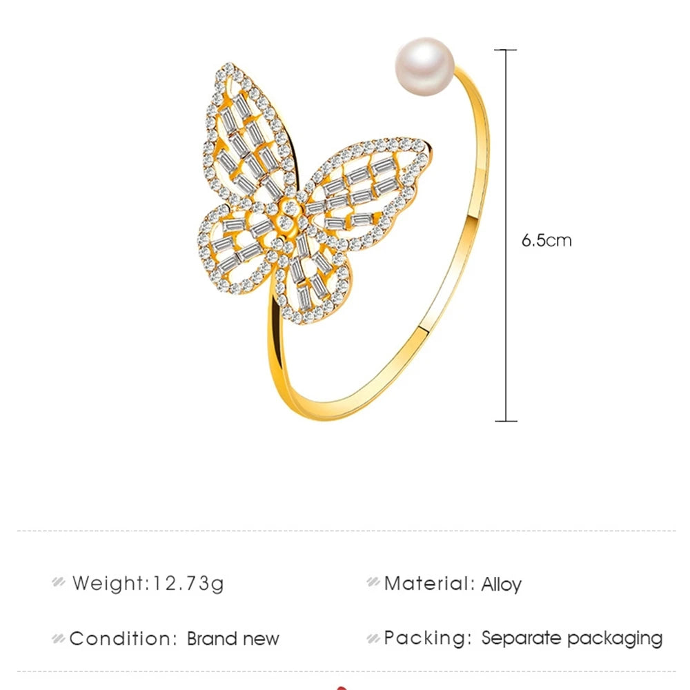 Elegant butterfly bracelet with hollow zircon, pearl, and crystal pendant. Adjustable bangle for women's hand jewelry gift