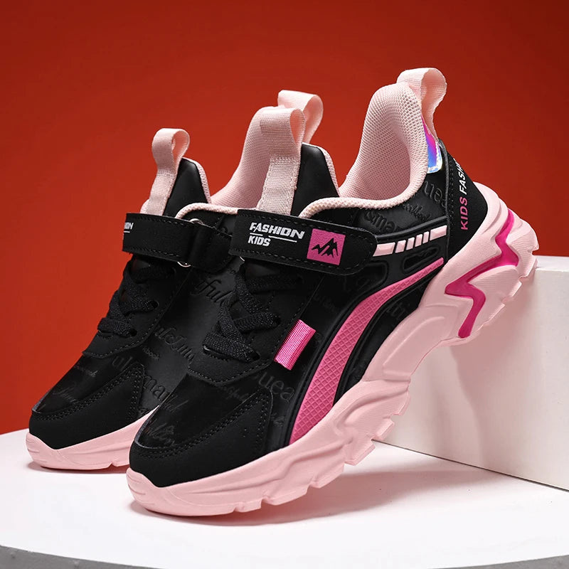 Pink leather girls' sneakers for casual wear. Comfortable and breathable, suitable for running and sports activities