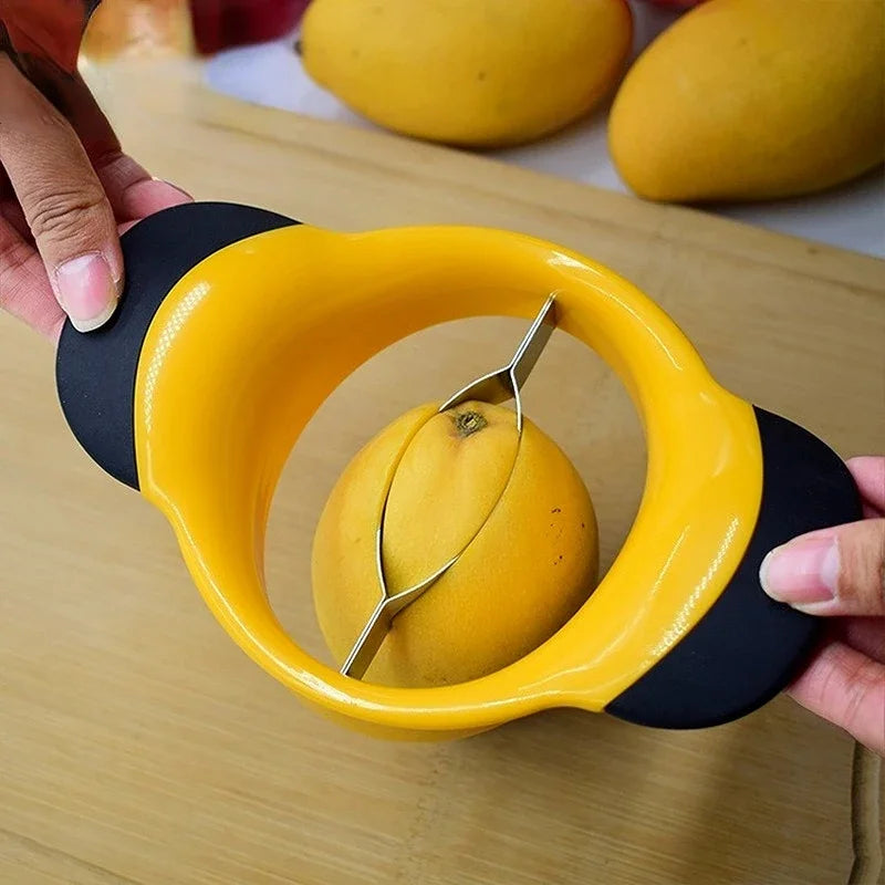 Streamline: "Mango corer, slicer, cutter, and pit remover, also works for watermelon. A versatile kitchen tool for fruit and vegetable prep