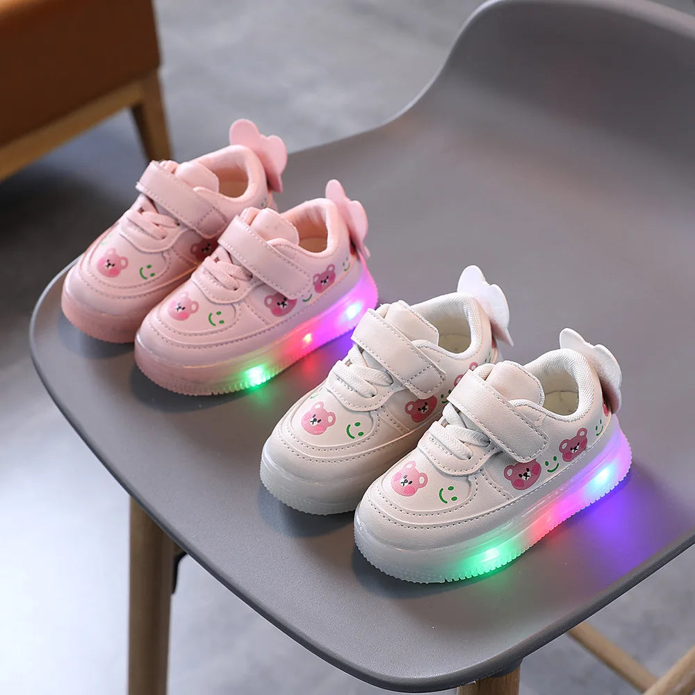 High-quality LED light-up sneakers for girls and boys featuring soft glowing soles and an adorable bear design