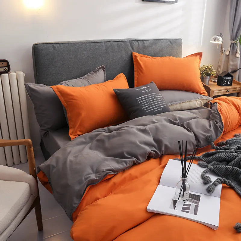 Solid Color Bedding Set in Orange and Grey, Available in Single and Double Sizes. Includes Bed Linen, Duvet Cover, and Pillowcase. No Fillings. Suitable for Kids and Adults. Ideal for Home Textiles.